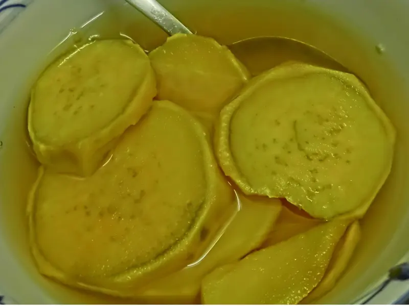 Sweet potato slices in ginger syrup