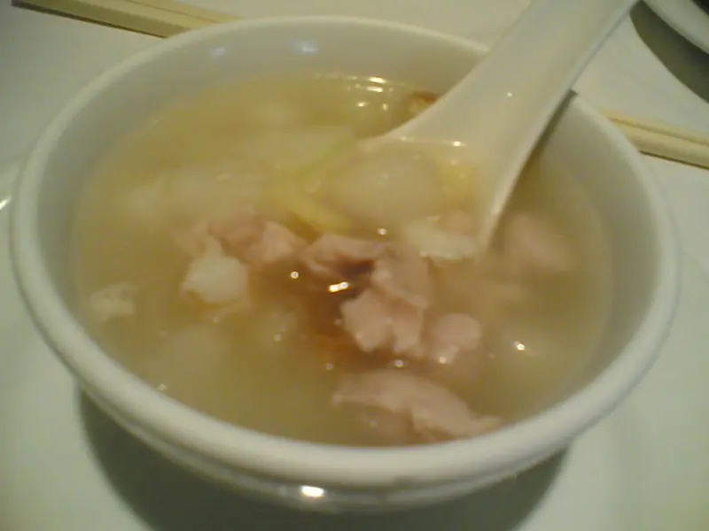 A bowl of winter melon soup with chicken